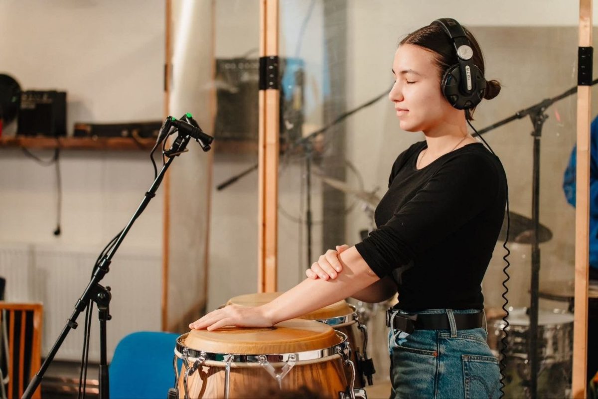 Recording percussion in the studio for the album